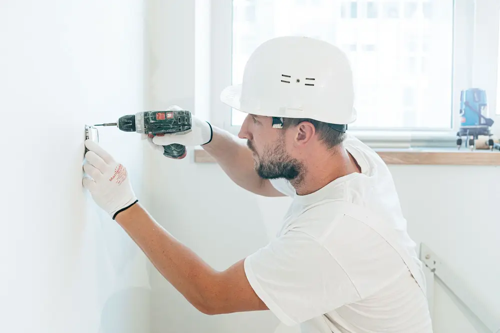 Home maintenance contractor at work in Nashua, NH
